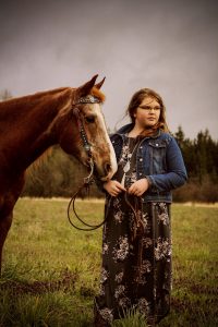 Morgan and scout standing in field