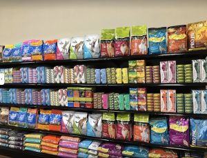 wall of pet food at Companion Cove