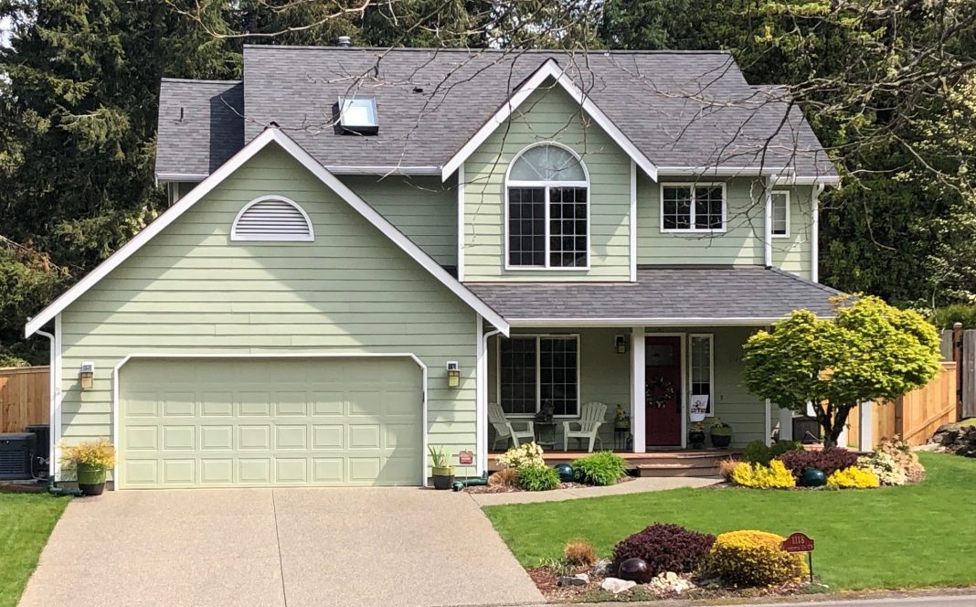 mint green, two story home