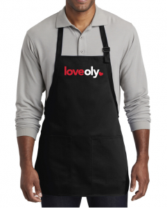 Man wearing black apron that says 'LoveOly' 