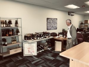 Ed Schlich examines a table of wines from France. 