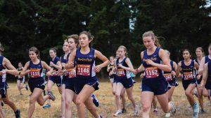 Pope John Paull II High School students running track