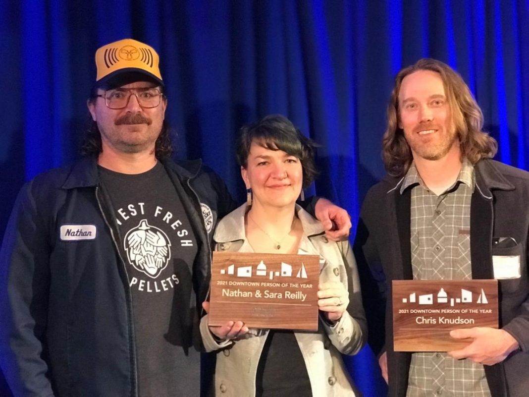 Nate and Sara Reilly of Three Magnets and Chris Knudson of Well 80 Brewhouse are shown here, named 2021 Person of the Year by the Olympia Downtown Alliance.