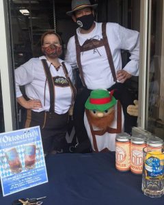 Stacey O'Connor and Alex Maffeo of Headless Mumby Brewing Company in lederhousen