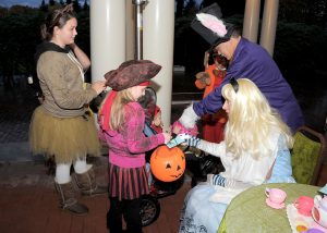 Kids trick or treating at the Governor's Mansion in various costumes