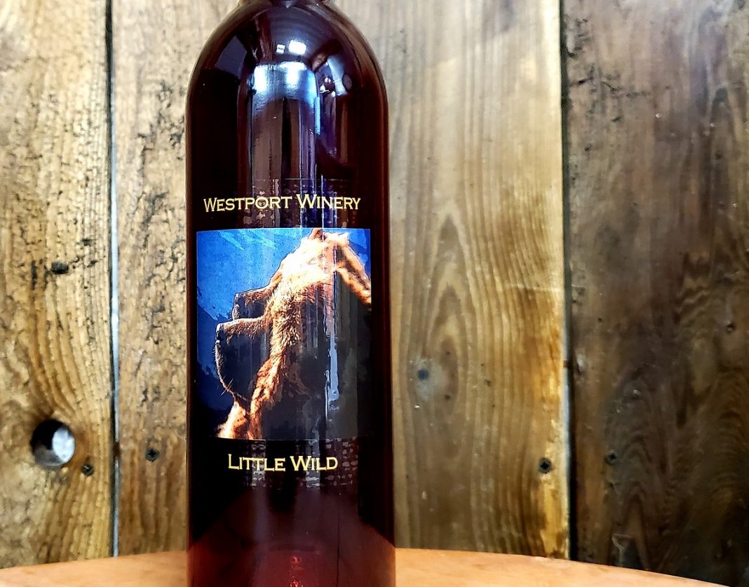 bottle of Westport Winery Little Wild against wood background