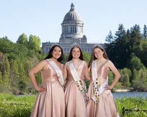 three lakefair ambassadors in gowns outside Capitol building