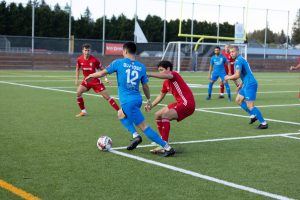 Oly Town FC playing soccer