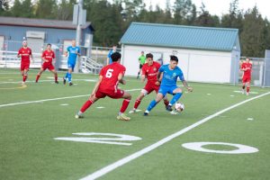 Oly Town FC playing soccer