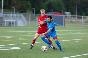 Oly Town FC playing soccer