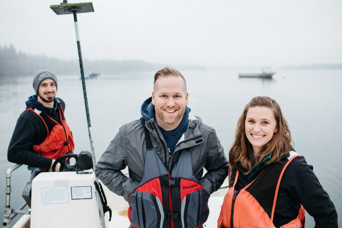 Shina Wysocki and her brother Kyle Lentz on a boat in the South Sound
