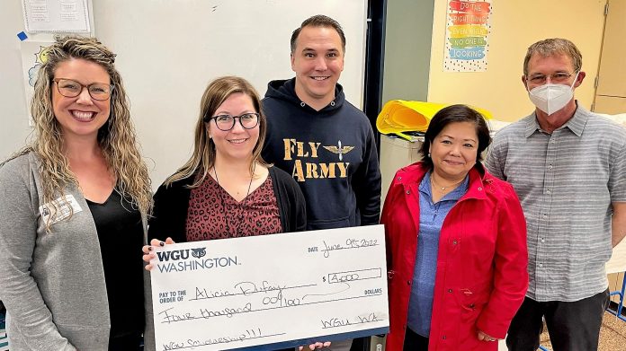 Alicia Dufay Military-Makeover-Western-Governors-University-Scholarship Alicia Dufay receiving her Western Governors University scholarship. Left to right: Constance Dodds of WGU, Alicia Dufay, Ben Dufay, Angela Condon of WGU, Garfield Principal Brendon Chertok.