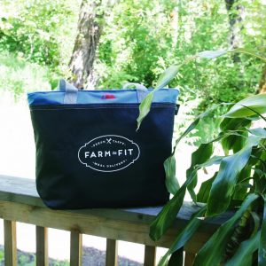 Farm to Fit delivery bag on a porch railing