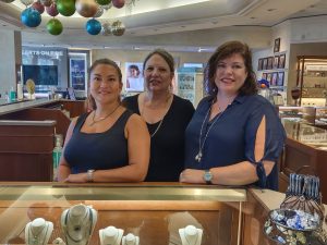 From left: general manager Kandy Watters, sales professional Valeria Rovella-Willis and owner Leslie Panowicz.