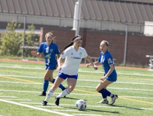 Oly Town FC women's team playing soccer