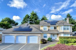 House with solar panels on garage roof
