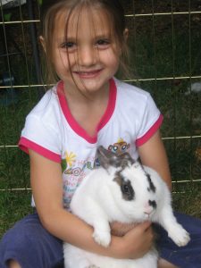 Eva C-M holding her bunny Diego