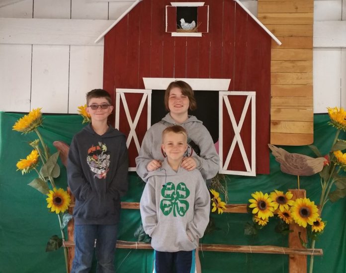 Shannon, Will and Justin Allen pose at the 2019 Thurston County Fair.
