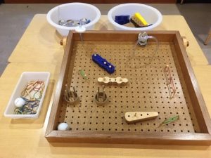 pegboard pinball  on a table
