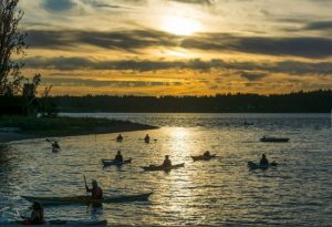 kayakers on the Puget Sound at sunset