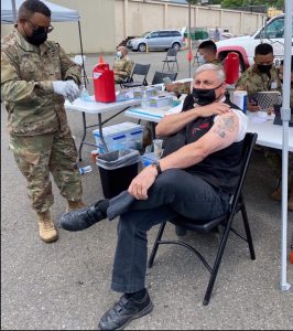 Lincoln Creek Lumber associate getting COVID-19 vaccine