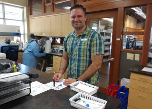 Ryan Martin, pharmacist at NW Remedies standing in the pharmacy