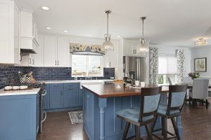 A blue kitchen, part of the Olympia Master Builder's Home Tour 2022