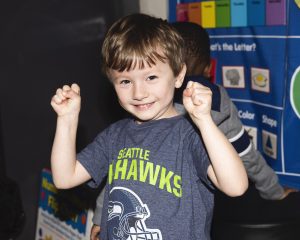 young kid with a happy face