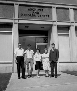 Sid and staff standing outside the archives in 1963