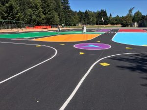 McKenny Elementary traffic garden created by Intercity Transit with colorful roadways painted on pavement
