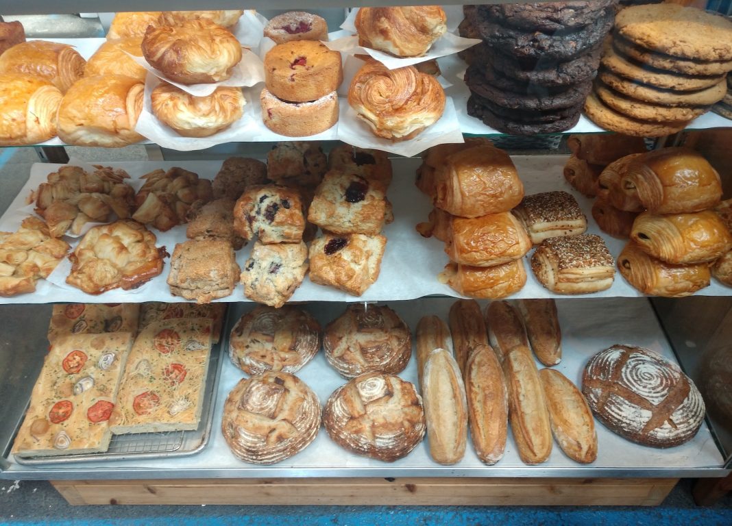 rows of baked goods at the Olympia Farmers Market