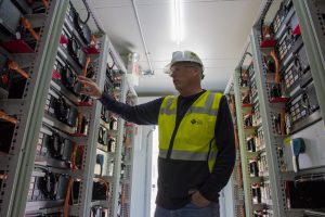 Puget Sound Energy staff inside the storage unit