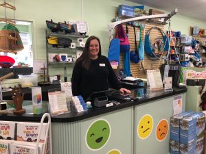 Lauren Howard, Sensory Tool House's director of resources,  standing at the counter