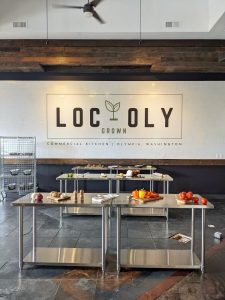 cooking tables with some food and cooking supplies on them at the commercial kitchen at Capital Mall in Olympia 