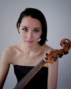 Caroline Nicolas headshot with a cello