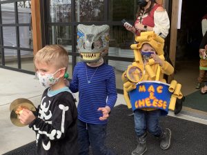 Three kids in halloween costumes at the Hands On Children's Museum's Boo Bash 