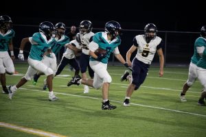 Northwest Christian Schools of Lacey football team on the field