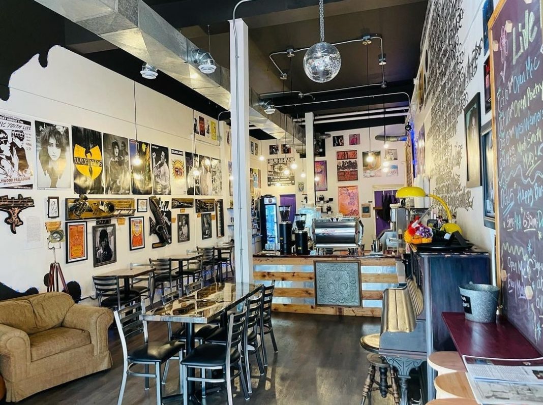 Interior of Rhythms Coffee in Olympia with chairs, white walls with posters and bright lights