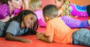 kids lying on mats at The Little Gym in Olympia