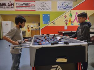 kids playing foosball at the Boys & Girls Clubs of ThurstonTalk