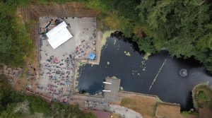 Aerial view of the empty Tenino quarry basin with an Olympia symphony concert