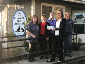 a group of OlyFed employees at Concern for Animals