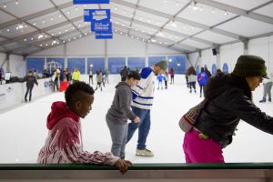 People skating at Oly on Ice, ice rink in Olympia