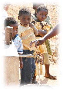 kids in a community getting clean water thanks to Cool Jazz Clean Water