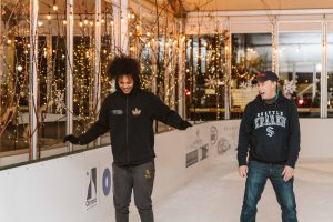 two kids skating at Oly on Ice in Olympia