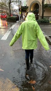 person walking in the rain