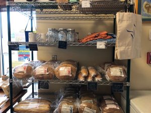 baked breads on a rack at the Blue Heron Bakery
