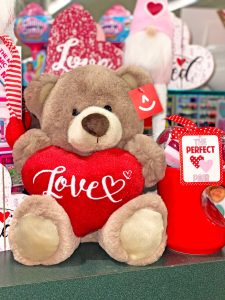 plush teddy bear holding a red heart that says love at Olympia Thriftway stores