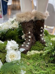 closeup of santa boots made of flowers