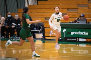 evergreen state college women playing basketball